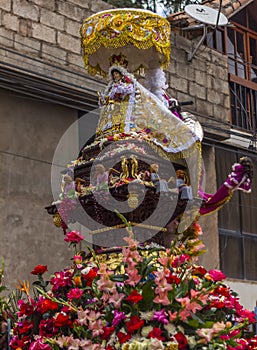 Virgen del Carmen icon parade Pisac Cuzco Peru photo