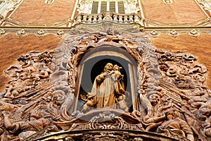 Virgen del Rosario enclosed in a niche of Palacio del Marques de Dos Aguas, Valencia
