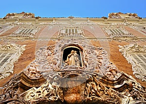 Virgen del Rosario enclosed in a niche of Palacio del Marques de Dos Aguas, Valencia