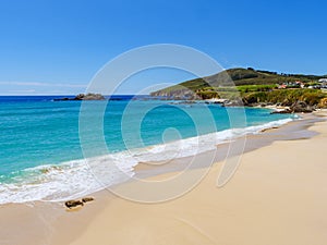 Virgin beach with turquoise water in North Spain photo