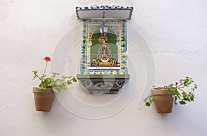 Virgin of La Soledad on decorative ceramic tiles