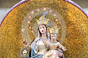 Virgin Mary with baby Jesus, crowned, blessing