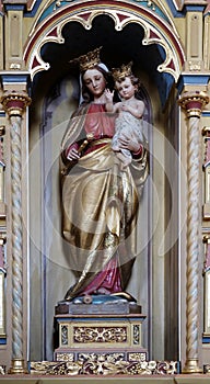 Virgin Mary with baby Jesus statue on altar of Our Lady in the church of St Matthew in Stitar, Croatia