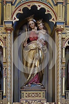 Virgin Mary with baby Jesus statue on altar of Our Lady in the church of St Matthew in Stitar, Croatia