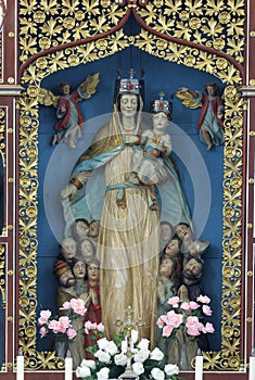 Virgin Mary with the baby Jesus statue on the high altar in the church of Our Lady of Miracles in Ostarije, Croatia