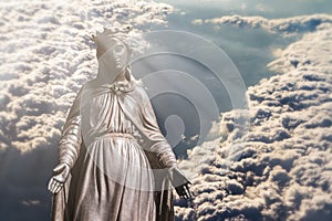 Virgin Mary in Clouds photo