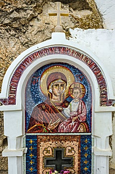 Virgin Mary - mosaic icon in rocky Serbian Orthodox Christian mo