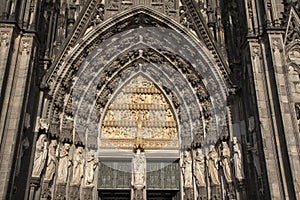 Virgin Mary Statue and Main Entrance, Facade of Cologne Cathedral