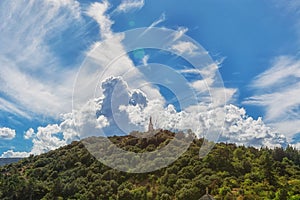 The Virgin Mary statue on the mountain top outside the village V