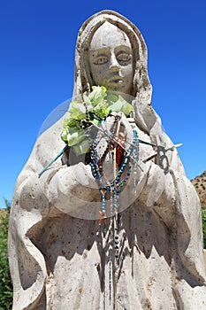 Virgin Mary Statue with Rosaries