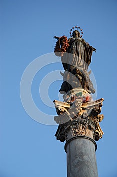 Virgin Mary on top at Piazza di Spagna in Rome Italy photo