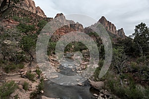 Virgin River flowing over rocks below the Watchmen Rocks