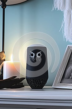 virtual assistant voice command speaker on a desk
