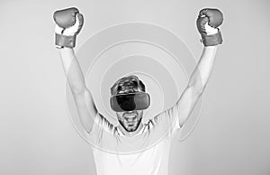 Virtual champion. man use new technology. man in VR glasses. Futuristic gaming. boxing in virtual reality. Digital sport