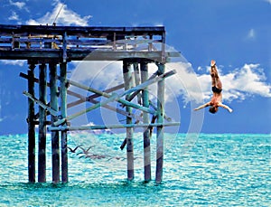 A virtual diver takes a chance diving off the end of the beach fishing pier