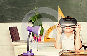 Virtual education. Child cute pupil wear hmd vr glasses. Studying in virtual reality. Modern technology. Interesting