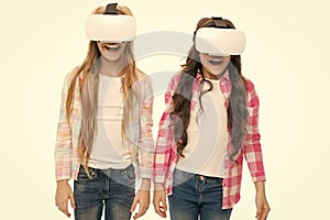 Virtual education. Kids wear hmd explore virtual or augmented reality. Future technology. Girls interact cyber reality