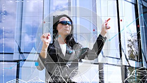 Virtual holographic interface and young woman wearing glasses