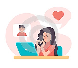 Virtual online date video communication. Girl calls boyfriend, gestures hands show shape of heart. Love relationships at distance