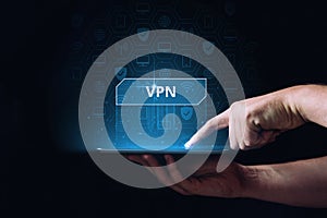 Virtual Private Network or VPN. Person holding tablet with icons hologram
