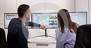 Virtual Real Estate Renovation: Female Agent Using Computer