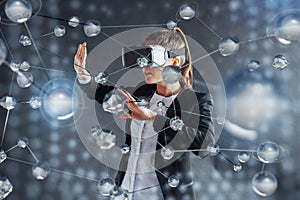 Virtual reality, 3D-technologies, cyberspace, science and people concept - happy woman in 3d glasses touching projection