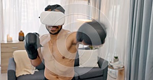 Virtual reality glasses, home fitness and man boxing in living room for innovation workout and futuristic training