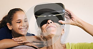Virtual Reality Happy Grandmother And Young Girl Playing Together