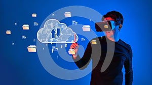Virtual Reality User Interacting with Cloud Storage Interface in Digital Environment Representing Modern Computing and