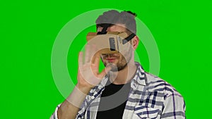 Virtual reality. VR glasses. Green screen. Close up