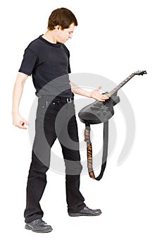 Virtuoso guitarist, dressed in black photo
