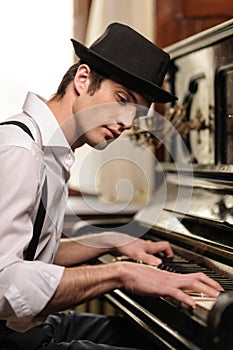 Virtuoso playing piano photo
