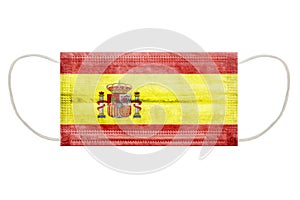 Virus mask with flag of spain on an isolated white background. Symbol of protection against coronavirus infection