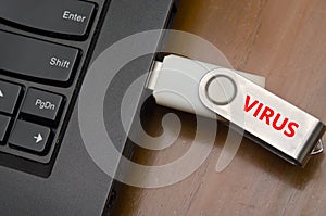 Virus USB thumb drive plug in to laptop computer port
