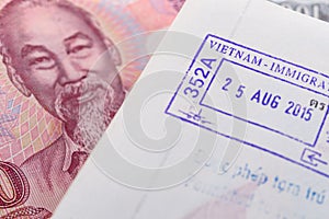 Visa passport stamp from vietnam and Vietnamese money (Dong)