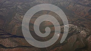 Visas from the porthole of an airplane.