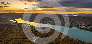 Visegrad, Hungary - Aerial panoramic drone view of the beautiful high castle of Visegrad and Salamon tower with autumn foliage