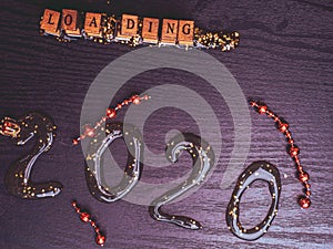 Vision 2020 loading Progress bar design with red garlands, business style concept. isolated on wooden Background
