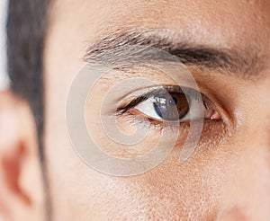 Vision, eye and portrait of man closeup, thinking and ideas for startup business with focus and commitment. Motivation