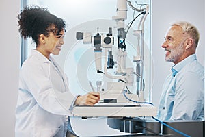 Vision, eye test and healthcare with a doctor woman or optometrist testing the eyes of a man patient in a clinic