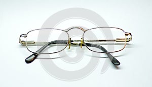 Vision glasses are isolated on a white background. Real Granny glasses for reading books and Newspapers . Glasses with close -up l