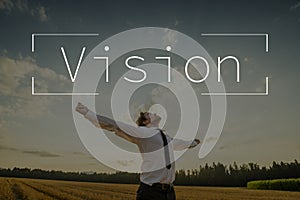 Vision text over businessman with open arms photo