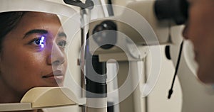 Vision, woman and eye test in clinic, machine and eyecare with optical exam, medical and patient. Technology, office and photo