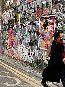 Mixed graffiti art on the streets of Brick Lane, East London Uk