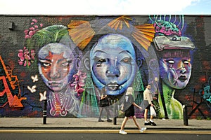 Giant graffiti art on the streets of Brick Lane , East London Uk