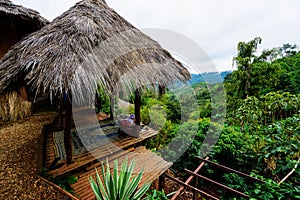 Visitor relax at cliff wooden hut