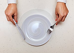 Visitor which holds knife and fork