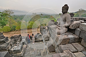 Visitors at Borobudur temple. Magelang. Central Java. Indonesia