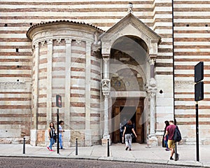 Visitors enter Duomo Cattedrale di S. Maria Matricolare cathedral, Verona