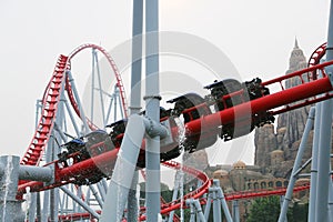 Visitors Happy Valley amusement park ride a rollercoaster